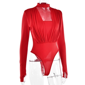 Detail of red long sleeve bodysuit featuring a high collar, hollow cutout and pleated chest