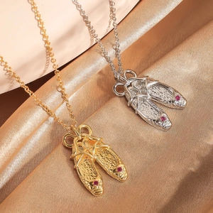 Elegant ballet slippers pendant necklace set in gold and silver finish on silk