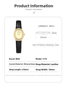 Detail view of oval ladies watch with crystal bezel and black embossed leather strap