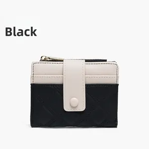 Short bi-fold wallet featuring black quilted faux leather and cream button closure details