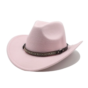 Detail of pink wool felt cowboy hat with ethnic braided band and leather strap