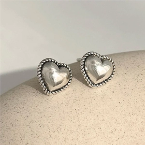 Minimalist 925 sterling silver heart stud earrings with vintage braided texture design
