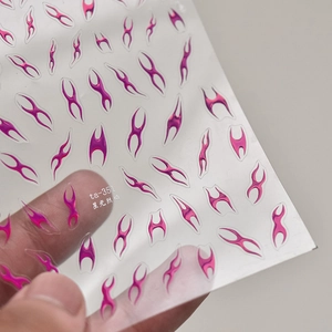 Metallic rose red flame nail stickers ta-351 with starry flame patterns on a sheet