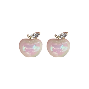 Sweet pink pearlescent apple stud earrings with rhinestones on a clean white background