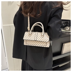 Creamy white crossbody box bag with brown geometric pattern and golden metal buckle