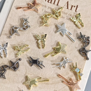 Punk style star and butterfly nail art charms with crystals in various metal finishes