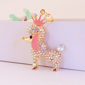 Rainbow rhinestone encrusted poodle keychain with pink enamel crown on gold metal