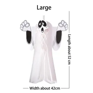 Detail of large white honeycomb ghost decoration with size markings 52cm by 42cm