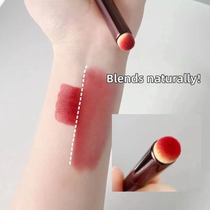 Close-up showing natural blending effect of round silicone lip brush on skin texture