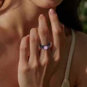 Gothic black skull ring for women with round purple zircon stone on model hand