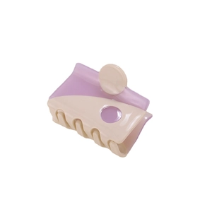 Minimalist beige and purple acetate hair claw clip with a square yin-yang color block design