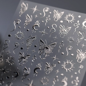Silver embossed nail stickers with metallic butterfly moon and star patterns