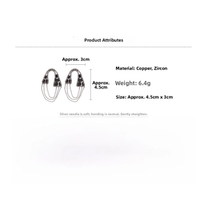 Détail des boucles d'oreilles pompon en zircon, dimensions de 4,5 cm x 3 cm et poids de 6,4 g