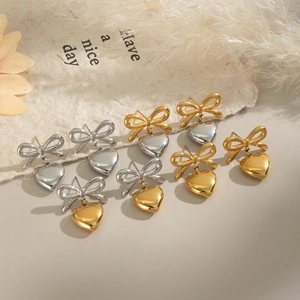 Elegant stainless steel bow heart earrings in gold and silver finishes for women