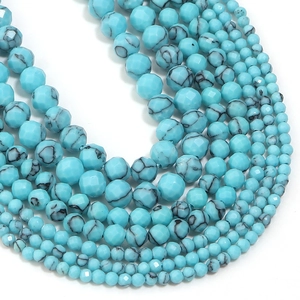 Macro detail of faceted turquoise gemstone beads for DIY jewelry making and crafts