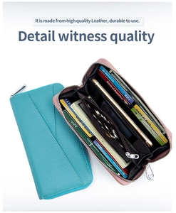 Detail view of large capacity leather wallet interior with RFID card slots and zip pocket