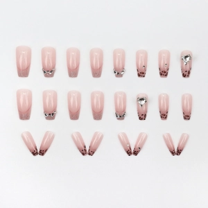Sparkling pink coffin fake nails with leopard print, glitter, and heart rhinestones