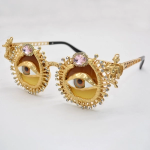 Vintage Baroque gold sunglasses with crystal devil eye lenses and cupid relief