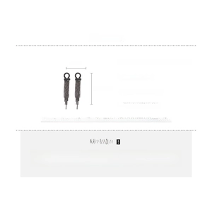 Detailed view of long black fringe tassel earrings with dimensions and material specs
