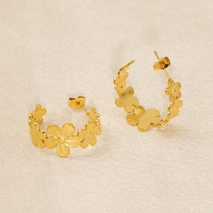 Elegant gold flower hoop earrings in stainless steel with detailed floral petal design