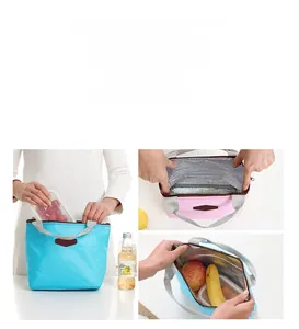 Detail of insulated lunch bag showing the interior thick aluminum foil and pink nylon exterior