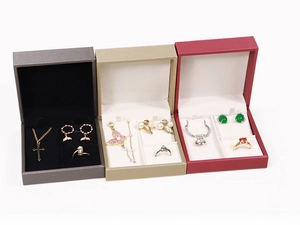 Detailed view of brushed leather jewelry gift boxes for rings, necklaces and earrings