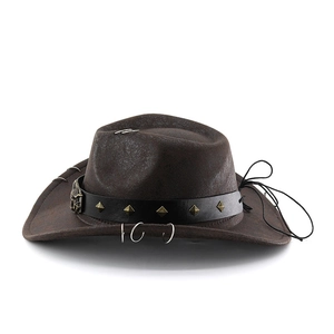 Detail of retro brown PU leather cowboy hat with metal rivets and bull emblem band