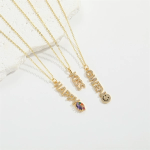 French vintage gold plated necklace with sparkly letter pendants and colorful gems
