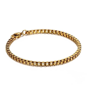 Detail of a thin gold box chain bracelet with a secure lobster clasp on white background