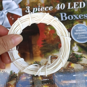 Close-up of small off-white Indonesian rattan ring for DIY handmade holiday decorations