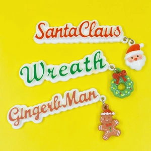 Christmas resin charm pendants with Santa, wreath, and gingerbread man for DIY crafts