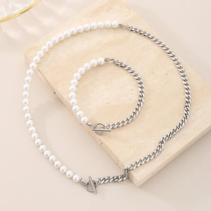 Elegant titanium steel Cuban chain and pearl jewelry set with silver OT clasp on stone
