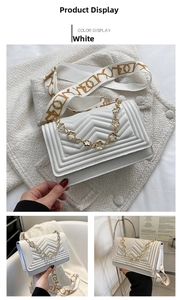 Detailed white quilted leather crossbody bag with flower-shaped chain and printed strap