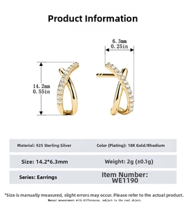 Macro view of S925 sterling silver X-shaped cross earrings with 18K gold and cubic zirconia