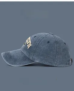 Detail of 3D letter embroidery and vintage washed cotton texture on baseball cap