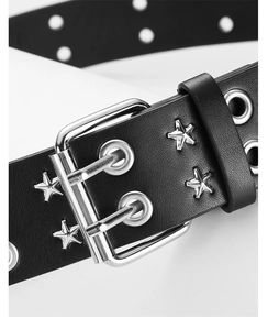 Detail of punk style PU belt with silver star rivets and double-row metal eyelets
