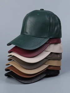 Close-up of premium PU leather baseball caps showing fine stitching in seven vibrant colors