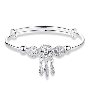 Minimalist 999 silver dreamcatcher bangle with feather tassels on a white background