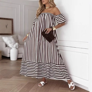 Detailed view of striped off-the-shoulder maxi dress with vertical and horizontal patterns