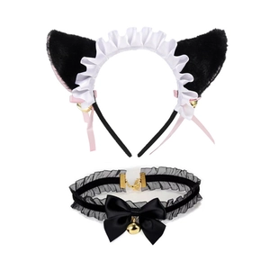 Close-up of cat ear headband and lace choker set with pink ribbons and golden bells