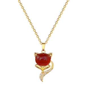 Elegant gold titanium necklace featuring a red fox pendant with sparkling rhinestones