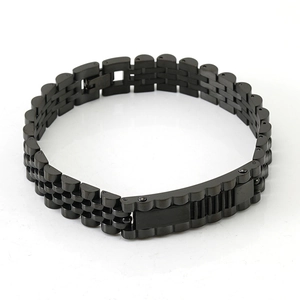 Detail of matte black stainless steel watch band style bracelet with smooth ID plaque