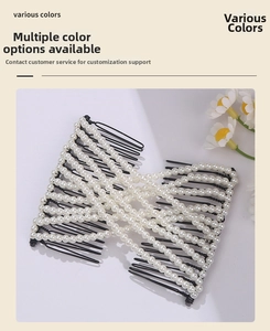 Detail of woven faux pearl hair comb with black metal base on a light background