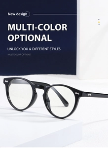 Close-up of retro round black glasses frame with metal rivets on a geometric stand