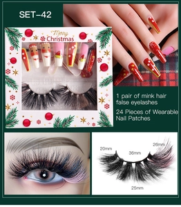 Christmas makeup set featuring festive red press-on nails and colorful false eyelashes