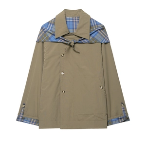 Flat lay of khaki jacket with blue and brown plaid contrast and detailed button texture