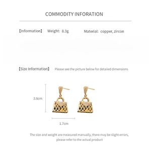 Detailed size chart and specifications for zircon handbag-shaped earrings in gold finish