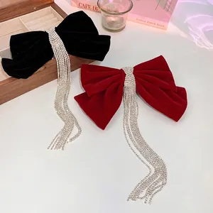 Elegant velvet bow hair clip with rhinestone tassels in black and red for women