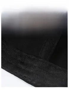 Detail of wide moisture-wicking headband with breathable mesh fabric on black baseball cap