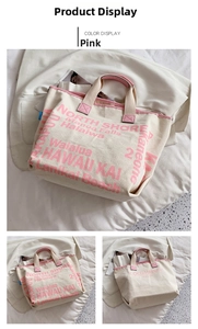 Detailansicht der Canvas-Tragetasche mit rosa Akzenten und Hawaii-Schriftzug-Design